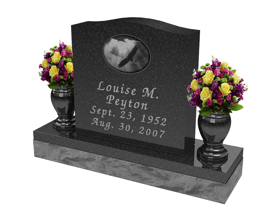 Single upright headstone in black granite featuring etched eagle image