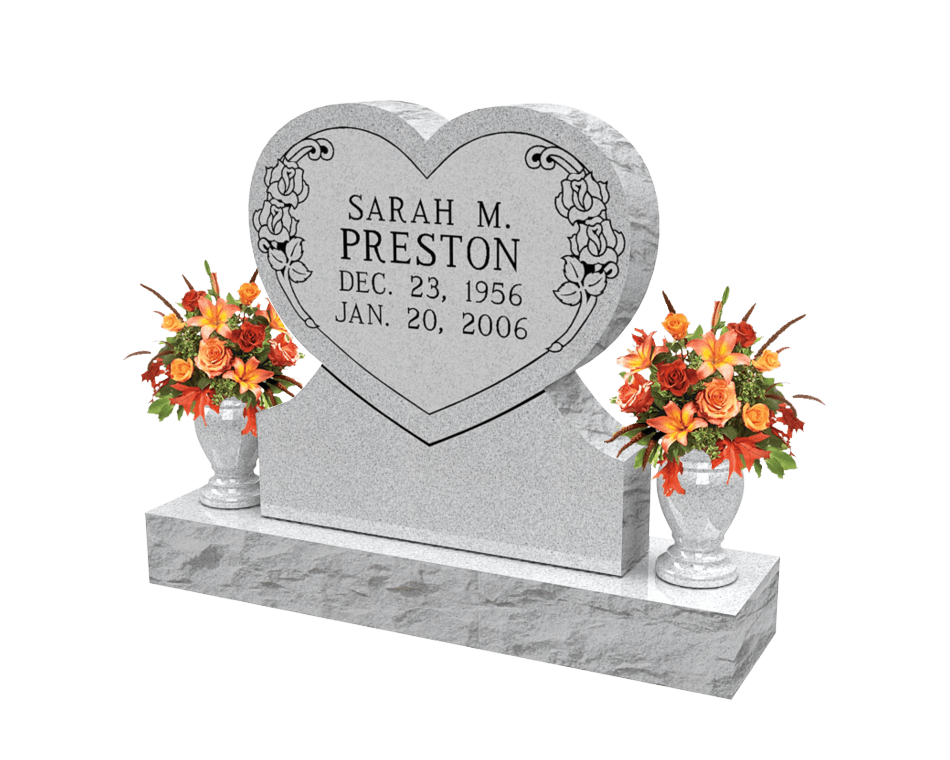 Single upright heart-shaped headstone in light grey granite with two vases 
