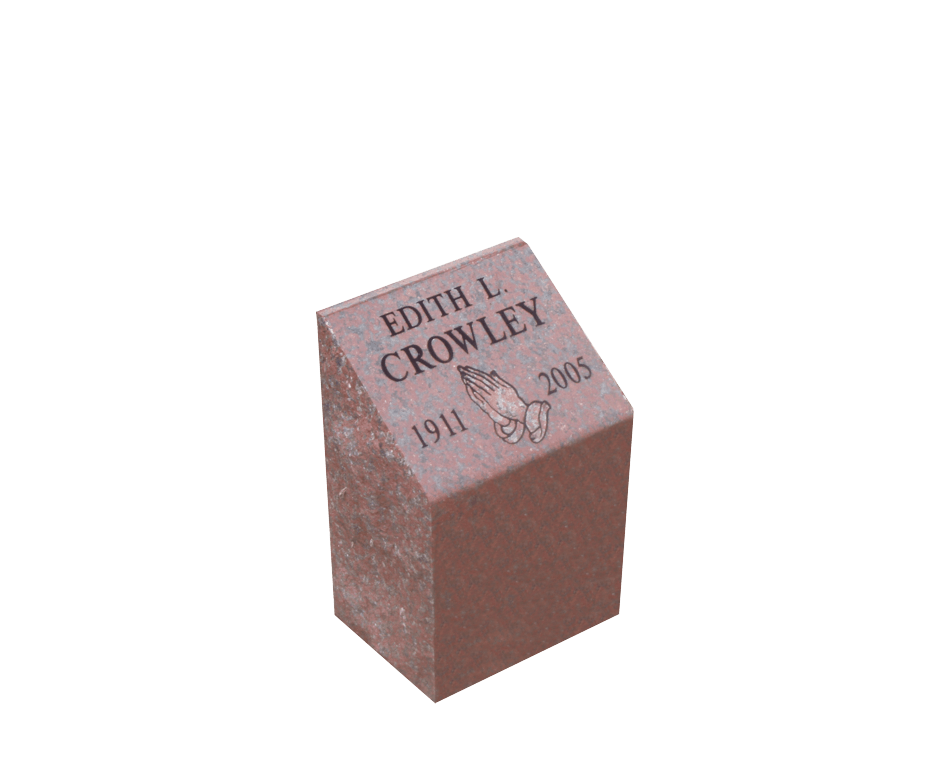 small red stone rectangular cremation memorial with slanted top engraved with praying hands and name information