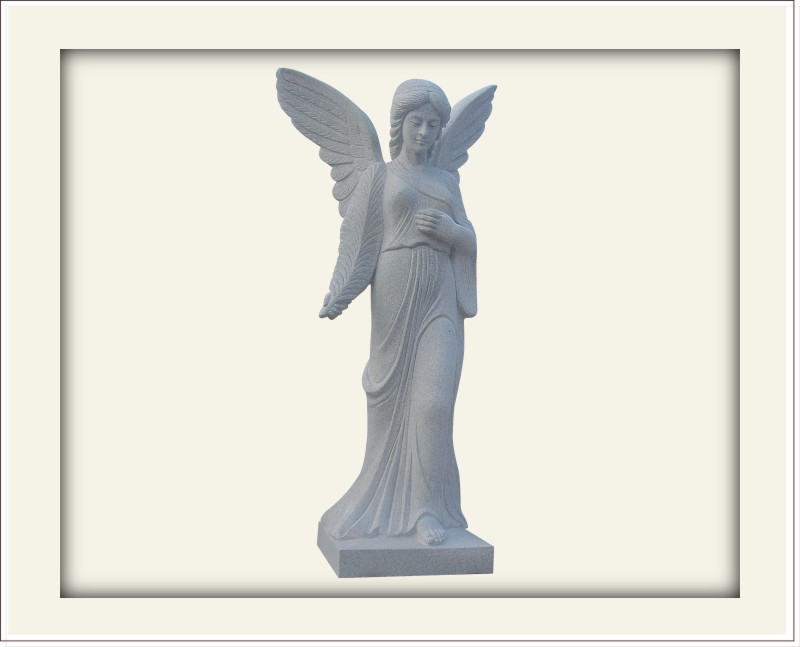 Light grey statue of a walking angel