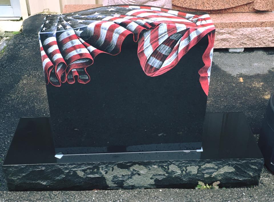 Memorial with a custom etched American Flag